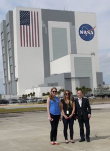 Micro-10: USC School of Pharmacy doctoral candidates Adriana Blachowicz and Jillian Romsdahl with Professor Clay Wang at Kennedy Space Center.