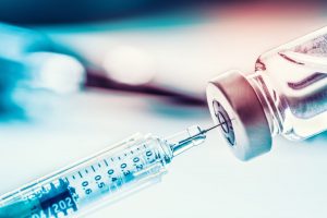 Syringe with Covid vaccine