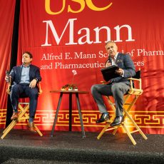 Robert Popovian, chairman of the USC Mann Board of Councilors, talks with AJ Loiacano, CEO of Judi Health and Capital Rx. (Photo by David Zong/USC Mann)